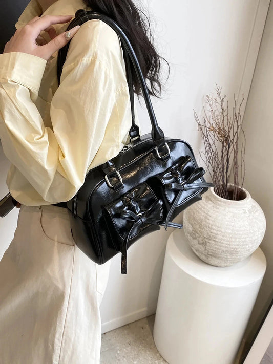 Double Black pocket front ribbon shoulder bag